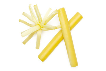 Group of two whole one piece of smoked slovak string cheese stick thick shreds flatlay isolated on white background
