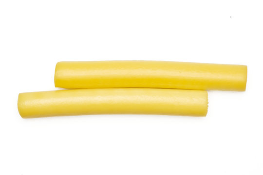 Group of two whole smoked slovak string cheese stick flatlay isolated on white background