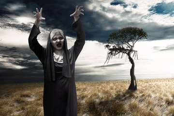 Scary devil nun with dark sky background