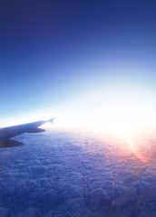 Airplane wing and beautiful  sunrise.  Travel concept.
