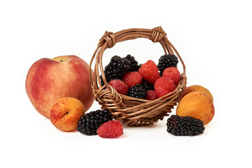 Peach, apricot, BlackBerry and raspberry isolated on white background