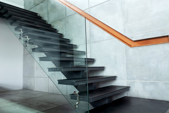 staircase in modern villa and cement wall.