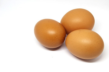 three eggs isolated on white background