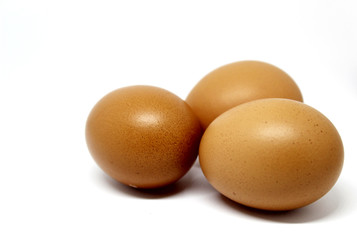 three eggs isolated on white background