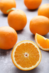 Orange fruit on grey wooden table