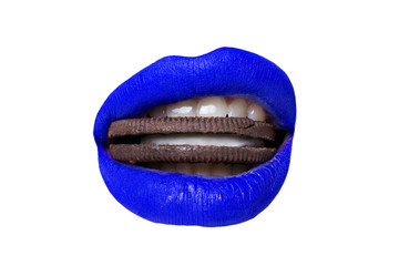 Female lips with blue lipstick bites cookies on white background closeup