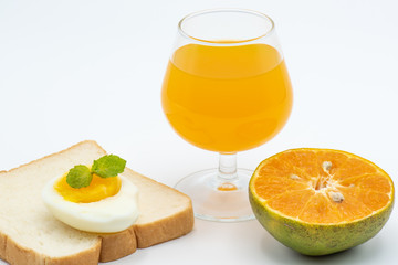 Glass of orange juice with heathy foods