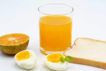 Glass of orange juice with heathy foods