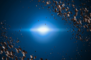 flying coffee beans across dark background. Concept studio shooting. High speed freezing photo