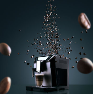 Coffee machine with flying coffee beans across it on dark background. Concept studio shooting. High speed freezing photo