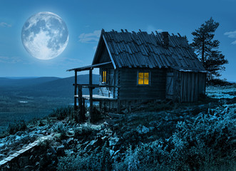 Santa's secret cottage in magic moonlight