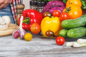 Colored vegetables and different greenery