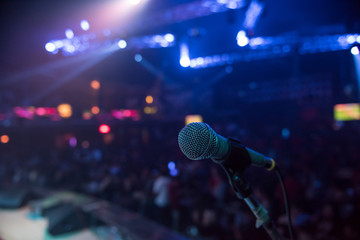 Microphone on stage in club with background