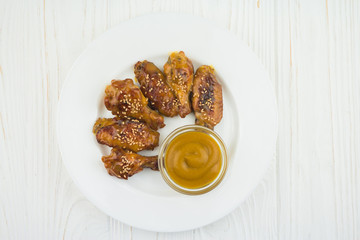 chicken wings and mustard sauce, top view
