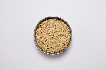 Macro view of natural organic oats seeds on background