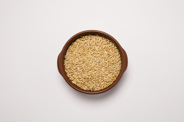 Macro view of natural organic oats seeds on background