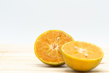 Orange slice on wood table