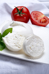 Fresh soft white burrata, ball buttery cheese, made from a mix of mozzarella and ricotta cream, original from Apulia region, Italy, very popular soft cheese in USA