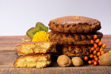 Round Dutch homemade cookies filled with marzipan and almonds nuts, autumn and winter seasonal dessert in Netherlands