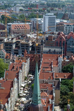 Townscape  with red roofs in old city Gdansk made from top, aerial landscape with tilt-shift lens