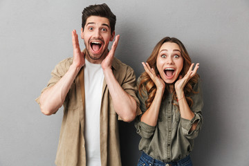 Portrait of a happy young couple standing together