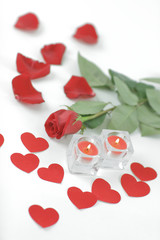 romantic concept .burning candle and red rose . photo with copy 