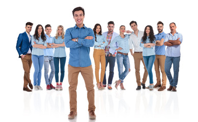Obraz premium happy and confident team leader in front of his group
