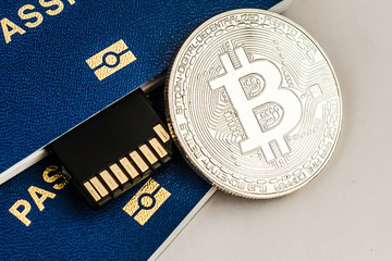 foreign passports and bitcoin coin ukraine and cryptocurrency concept isolated on white