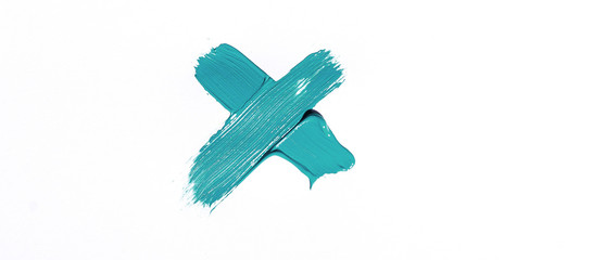 Turquoise brush stroke isolated over white background