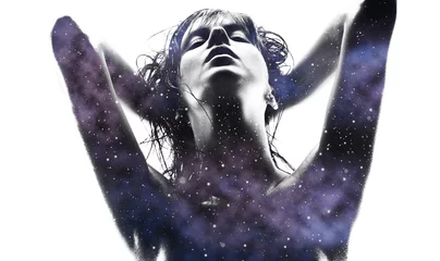 beauty and sensuality concept - double exposure of beautiful seductive woman and purple galaxy over white background © Syda Productions