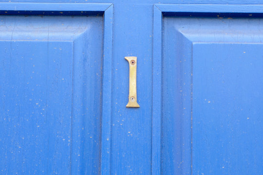 House Number 1 Sign On Blue Door