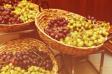 Composition with fresh ripe grapes on table