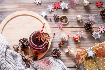 drink mulled wine on a wooden background