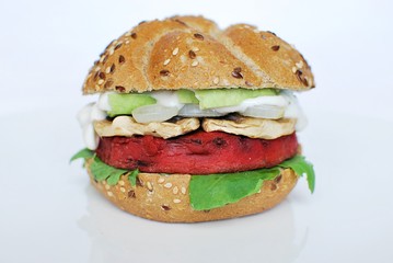 Tasty beetroot burger on white background. Vegan food.