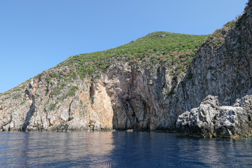 rock formation at paradise beach of Liapades at Corfu Island (Greece). Sedimentary rock cliff of chalk rocks