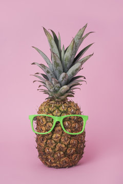 pineapple wearing green eyeglasses