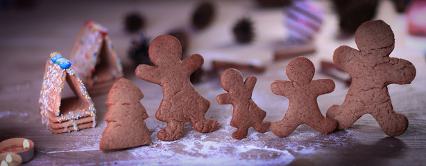 candles and gingerbread men at the Christmas table