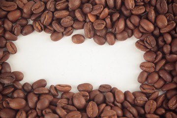 frame for text from grains of black coffee.photo with copy space