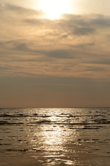Fototapeta premium Cloud sunset over sea.