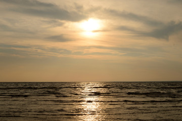 Fototapeta premium Cloud sunset over sea.