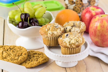 Preparation of school lunch. Cup cakes and cookies.