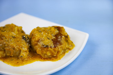 Delicious cutlets with tomato sauce