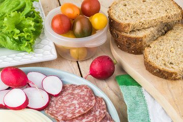 Preparation of school lunch sandwiches.