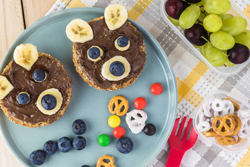School lunch chocolate spread banana blueberry sandwich for kids.