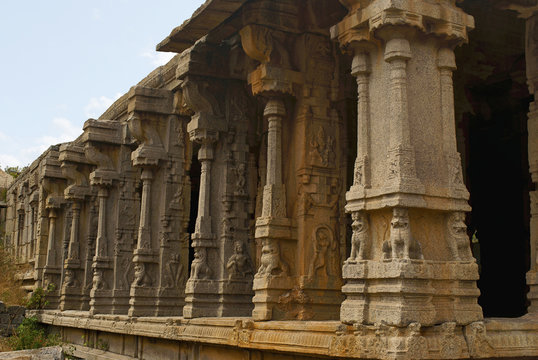 Carved pillars of the Kalyana Mandapa, Divine Marriage Hall, Achyuta Raya temple, Hampi, Karnataka. Sacred Center. General view from the south-east.
