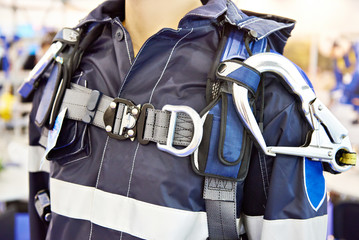 Working jacket with belt and carabiners for high-altitude work