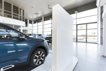 Car showroom with expensive vehicles for sale and rent