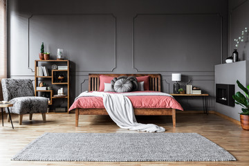 Spacious grey and pink bedroom