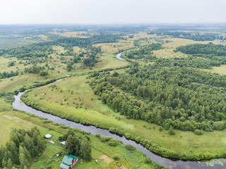 aerial view of the countryside, fields and forest 