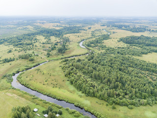 aerial view of the countryside, fields and forest 